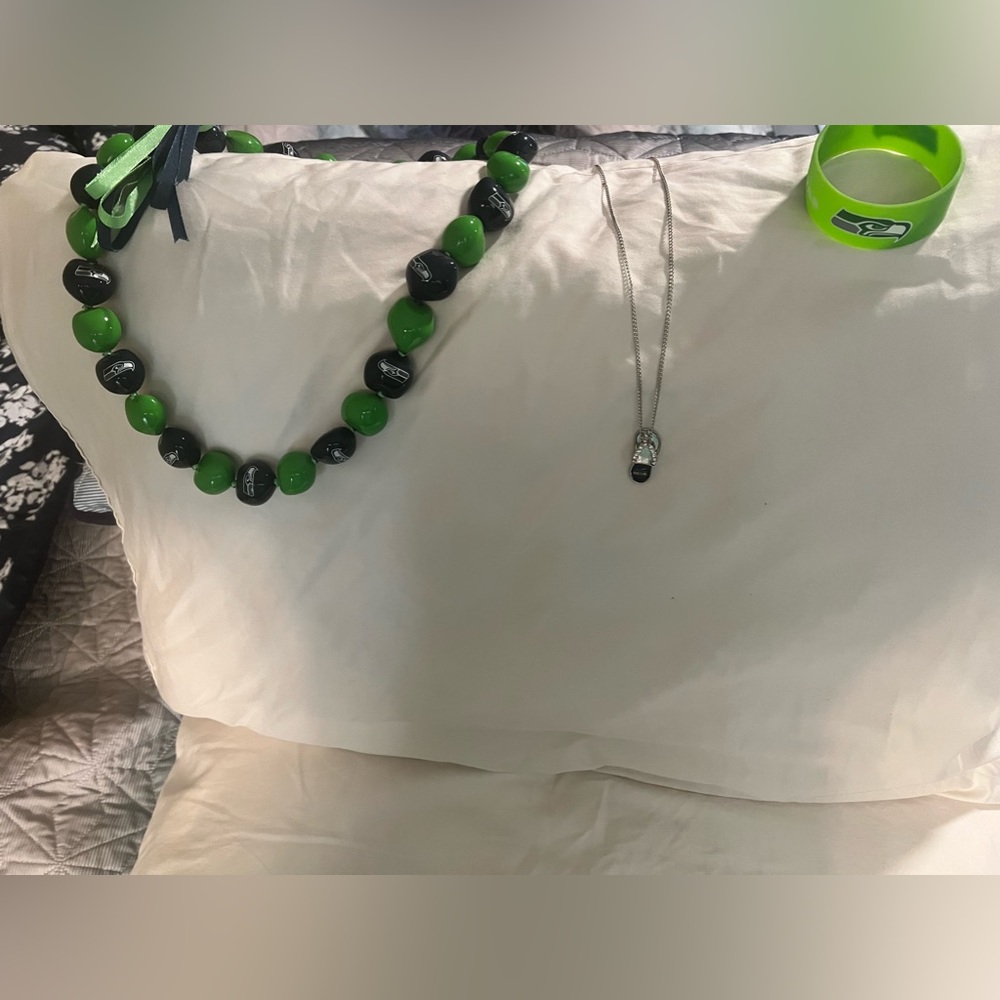 Seattle Seahawks lot of 2 necklaces and bracelet.